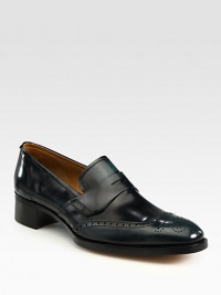 Classic loafer design beautifully crafted in Italian calfskin leather.Leather upperLeather liningLeather soleMade in Italy