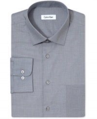 Get a firm handle on solid office-style and comfort with this dress shirt from Calvin Klein. Get a firm handle on solid office-style and comfort with this dress shirt from Calvin Klein.