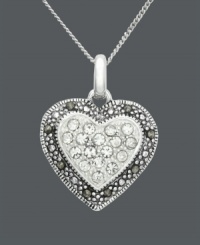 Say it from the heart, Genevieve & Grace's exquisite heart pendant makes the perfect gift for the one you adore. Crafted in sterling silver with sparkling, round-cut crystals and marcasite edges. Approximate length: 18 inches. Approximate drop: 1 inch.
