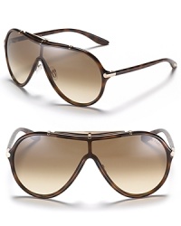 Retro-inspired shield sunglasses with a sweat bar and subtle metal accents for a casual and cool look. Retro-inspired shield sunglasses with a sweat bar and subtle metal accents for a casual and cool look.