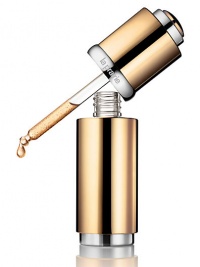 Luxurious. Opulent. Precious. Truly the gold standard of de-aging, this newly enhanced skin-enriching super serum, with a fresh new scent, gives your face a 24-karat glow. Newly developed peptides join Pure Gold, suspended in a colloidal gel, to help prevent the breakdown of collagen and elastin and improve elasticity and firmness.With one single drop, it diminishes lines and wrinkles and helps regulate pigmentation, while re-vitalizing and illuminating the skin with a stunning radiance. Luxurious. Opulent. Precious. Truly the gold standard of de-aging, this newly enhanced skin-enriching super serum, with a fresh new scent, gives your face a 24-karat glow. Newly developed peptides join Pure Gold, suspended in a colloidal gel, to help prevent the breakdown of collagen and elastin and improve elasticity and firmness.With one single drop, it diminishes lines and wrinkles and helps regulate pigmentation, while re-vitalizing and illuminating the skin with a stunning radiance.