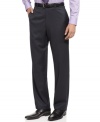 Smooth, smart and sophisticated. These flat front navy tic dress pants from Calvin Klein provide the perfect complement to your favorite dress shirts and ties.