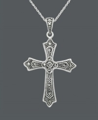 The perfect accent piece to portray your faith. Genevieve & Grace's intricate cross pendant features glittering marcasite in sterling silver. Approximate length: 18 inches. Approximate drop: 1-5/8 inches. The perfect accent piece to portray your faith. Genevieve & Grace's intricate cross pendant features glittering marcasite in sterling silver. Approximate length: 18 inches. Approximate drop: 1-5/8 inches.