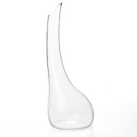 Handmade and mouth blown in Austria by world-renowned glassmakers, the graceful silhouette of a swan serves as the inspiration for the Riedel Cornetto Single Wine Decanter. Crafted from full-lead crystal for clarity and brilliance, the decanter assists in exposing wine to oxygen for a more developed bouquet and fuller flavors. Handmade and mouth blown in Austria by world-renowned glassmakers, the graceful silhouette of a swan serves as the inspiration for the Riedel Cornetto Single Wine Decanter. Crafted from full-lead crystal for clarity and brilliance, the decanter assists in exposing wine to oxygen for a more developed bouquet and fuller flavors.