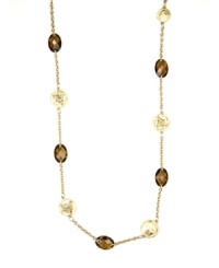 Great lengths: Jones New York's long chain necklace is elegantly enhanced by smoky topaz-hued stones and disc accents. Crafted in gold tone mixed metal with plastic stones. Approximate length: 36 inches. Great lengths: Jones New York's long chain necklace is elegantly enhanced by smoky topaz-hued stones and disc accents. Crafted in gold tone mixed metal with plastic stones. Approximate length: 36 inches.