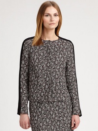 A classic tweed design with a modern, cropped silhouette and solid trim.Round neckSolid trim along sleevesButton frontAbout 22 from shoulder to hem41% polyester/19% polyurethane/18% acrylic/17% wool/5% polyamideDry cleanMade in ItalyModel shown is 5'10½ (179cm) wearing US size 4. A classic tweed design with a modern, cropped silhouette and solid trim.Round neckSolid trim along sleevesButton frontAbout 22 from shoulder to hem41% polyester/19% polyurethane/18% acrylic/17% wool/5% polyamideDry cleanMade in ItalyModel shown is 5'10½ (179cm) wearing US size 4.