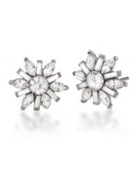 Winter wonderland. Add festive, fashionable flair to your style with Carolee's sparkling snowflake-shaped button earrings. Embellished with glittering glass accents, they're crafted in silver tone mixed metal. Approximate diameter: 1/2 inch. Winter wonderland. Add festive, fashionable flair to your style with Carolee's sparkling snowflake-shaped button earrings. Embellished with glittering glass accents, they're crafted in silver tone mixed metal. Approximate diameter: 1/2 inch.