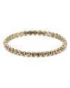 Twinkling topaz colored stones orbit around this brassy MARC BY MARC JACOBS bangle. It's so spot on.