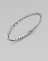 A simply twisted cable bangle of sterling silver is the essence of Yurman style. Sterling silver Cable, 4mm Diameter, about 2½ Made in USA