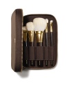 The Tom Ford Brush Set brings ease and luxury to applying your makeup. 5 brushes are meticulously crafted from the finest fibers to perform expertly with Tom Ford color cosmetics. The mahogany-brown, soft-sided portfolio, finished with Tom Ford's signature goldtone zipper, holds the TOM FORD Shade And Illuminate Brush, Bronzer Brush, Cheek Brush, Eye Shadow Contour Brush and Eye Shadow Brush. 