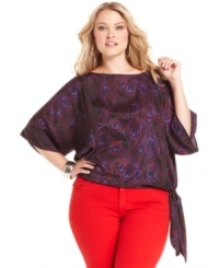 Flaunt a fashionable look with MICHAEL Michael Kors' butterfly sleeve plus size top, featuring a peacock-print. Flaunt a fashionable look with MICHAEL Michael Kors' butterfly sleeve plus size top, featuring a peacock-print.