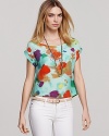 A watercolor-inspired print adds artistic flair to this ALTERNATIVE top.