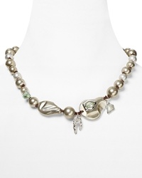 Classic style gets rebooted by Alexis Bittar. This modern take on the pearl necklace features a mix of shell based pearls, rhodium plate, quartz and Swarovski crystals. Classic style gets rebooted by Alexis Bittar. This modern take on the pearl necklace features a mix of shell based pearls, rhodium plate, quartz and Swarovski crystals.