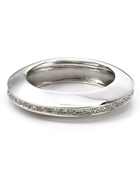 Crystals make a cool statement on this hinged cuff from Alexis Bittar, boasting rhodium plate and a chunky chic look. Resist the urge to stack: this bracelet stands out solo. Crystals make a cool statement on this hinged cuff from Alexis Bittar, boasting rhodium plate and a chunky chic look. Resist the urge to stack: this bracelet stands out solo.