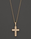 Petite diamond pavé-set cross pendant set in 14K yellow gold.