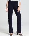 Rendered with a hint of stretch, these T Tahari pants glide over your curves for a fluid, flattering silhouette.