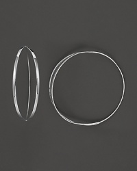 Get flirty with Lana's 14K white gold hoops. With an endless closure and sleek front split, these earrings add just the right amount of shine to your style. Get flirty with Lana's 14K white gold hoops. With an endless closure and sleek front split, these earrings add just the right amount of shine to your style.