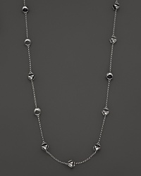 This bold sterling silver station necklace, gleaming with black onyx, is a brilliant showcase for Di MODOLO's iconic Triadra design.