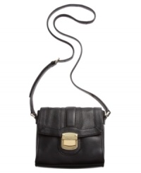 Petite yet perfectly sized for all your essentials, this go-anywhere silhouette from Calvin Klein offers instant versatility. Convenient crossbody strap keeps hands free for easy access to its many pockets and compartments, while glam gold-tone hardware adds instant appeal. Petite yet perfectly sized for all your essentials, this go-anywhere silhouette from Calvin Klein offers instant versatility. Convenient crossbody strap keeps hands free for easy access to its many pockets and compartments, while glam gold-tone hardware adds instant appeal.