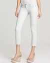These light-wash Paige Denim skinny jeans boast frayed and cropped hems-better to show off the season's favorite footwear.