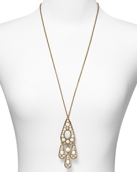The classic print plays muse to this paisley pendant necklace from kate spade new york, crafted of 12-karat gold plate and accented with white stones. The classic print plays muse to this paisley pendant necklace from kate spade new york, crafted of 12-karat gold plate and accented with white stones.