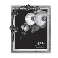 The Black Orchid Collection takes its inspiration from the intricacies of form and texture found in foliage from around the world. By interpreting plant forms in cast metal, Aram presents work which is evocative of a natural environment transformed and redefined. Each piece is an intimate expression of Aram's individual creativity as well as an object of infinite and timeless meaning. The Black Orchid Collection takes its inspiration from the intricacies of form and texture found in foliage from around the world. By interpreting plant forms in cast metal, Aram presents work which is evocative of a natural environment transformed and redefined. Each piece is an intimate expression of Aram's individual creativity as well as an object of infinite and timeless meaning.