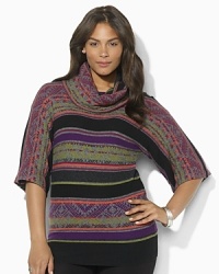 Crafted in a luxuriously soft blend of fabrics, a jacquard sweater features elegant kimono sleeves for ease of movement. Crafted in a luxuriously soft blend of fabrics, a jacquard sweater features elegant kimono sleeves for ease of movement.