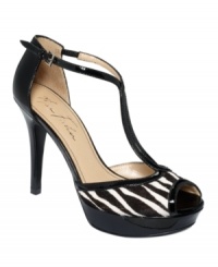 Strut your stuff in only the cutest t-straps. Marc Fisher's Tippy platform pumps are lady-like and trendy with an adjustable ankle strap for the perfect fit. Strut your stuff in only the cutest t-straps. Marc Fisher's Tippy platform pumps are lady-like and trendy with an adjustable ankle strap for the perfect fit.