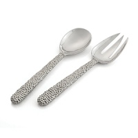 Marked by incredible handcrafting, this serving set features countless molten beads carefully placed by a highly skilled artisan. The look is streamlined, timeless, organic and soulful. Marked by incredible handcrafting, this serving set features countless molten beads carefully placed by a highly skilled artisan. The look is streamlined, timeless, organic and soulful.