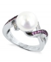 Stand out, in style. This sterling silver ring, with a cultured freshwater pearl (10-10-1/2 mm) and pink sapphire and diamond accents, proves to be quite captivating. Size 7.