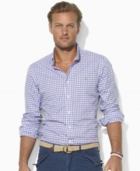 A handsome sport shirt is accented with Ralph Lauren's embroidered pony and tailored for a trim fit in checked cotton broadcloth. A handsome sport shirt is accented with Ralph Lauren's embroidered pony and tailored for a trim fit in checked cotton broadcloth.