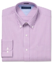 Thin stripes and a slim fit on this Tommy Hilfiger dress shirt lead a straight line to on-point style. Thin stripes and a slim fit on this Tommy Hilfiger dress shirt lead a straight line to on-point style.