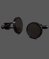 A bold statement. Modern sophistication comes in the form of these black stainless steel cuff links. A chic shape adds just the right touch to your favorite work shirt. Approximate diameter: 3/4 inch. A bold statement. Modern sophistication comes in the form of these black stainless steel cuff links. A chic shape adds just the right touch to your favorite work shirt. Approximate diameter: 3/4 inch.