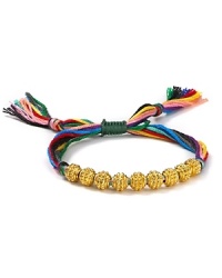 The classic friendship bracelet has officially gone glam. Shashi adds boldly hued cord and a row of gleaming Nepali gold beads for a look that's totally bright now. The classic friendship bracelet has officially gone glam. Shashi adds boldly hued cord and a row of gleaming Nepali gold beads for a look that's totally bright now.