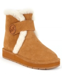 Furry and petitie. MICHAEL Michael Kors' Winter cold weather booties feature the designer's logo on the Velcro front closure and an ultra-cozy shearling lining. Furry and petitie. MICHAEL Michael Kors' Winter cold weather booties feature the designer's logo on the Velcro front closure and an ultra-cozy shearling lining.