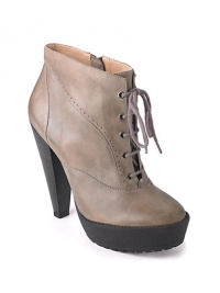 THE LOOKOval toeLace-up designSide zip closureAnkle designPerforated detailsV-shaped heelTHE FITHeel 4½ (115mm)Platform, 1½ (40mm)Compares to a 3½ heel (90mm)THE MATERIALLeather upperLeather lining Lugged rubber sole Padded insoleORIGINImported THE LOOKOval toeLace-up designSide zip closureAnkle designPerforated detailsV-shaped heelTHE FITHeel 4½ (115mm)Platform, 1½ (40mm)Compares to a 3½ heel (90mm)THE MATERIALLeather upperLeather lining Lugged rubber sole Padded insoleORIGINImported