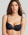 An exceptionally pretty underwire bra with intricate floral lace and a large sheer mesh bow at front. Style #953144