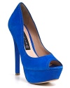 Lengthen legs with STEVEN BY STEVE MADDEN's towering platforms. With electric blue suede and a flirtatious peeptoe, they steal every show.