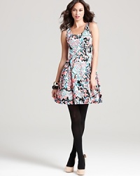 Fit for a garden party, a flared Lily Pulitzer dress proves that the fashion forecast is always sunny in picturesque florals. Fit for a garden party, a flared Lily Pulitzer dress proves that the fashion forecast is always sunny in picturesque florals.