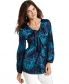 Create a beautiful look with Jones New York Signature's satin blouse, featuring a bright mottled print.
