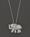 From the Tiny Treasures collection, a diamond elephant necklace; with signature ruby accent. Designed by Roberto Coin.