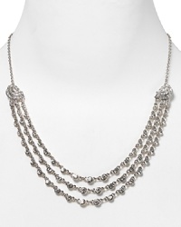 Give into glitz with this silver chain and crystal necklace from Carolee. Decked in dazzling crescent stations, it will add the perfect finish to any evening ensemble. Give into glitz with this silver chain and crystal necklace from Carolee. Decked in dazzling crescent stations, it will add the perfect finish to any evening ensemble.