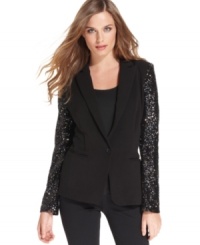 Sequined sleeves give this DKNYC blazer a party-worthy pop of panache. Sequined sleeves give this DKNYC blazer a party-worthy pop of panache.