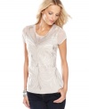 Tonal embroidery creates an appealing texture on INC's lightweight, layerable petite top. (Clearance)