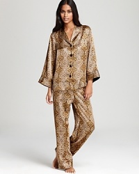 Venture into a wild world of dreams in Oscar de la Renta Pink Label's leopard-print sleep set.