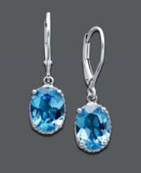 Add instant elegance to your look with perfect pools of color. Earrings feature oval-cut blue topaz (4-1/3 ct. t.w.) set in 14k white gold. Approximate drop: 1 inch.