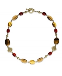 A wonderful mix of color and intrigue. Lauren Ralph Lauren's toggle necklace features multicolored resin, glass and semi-precious tiger's eye beads in antique 14k gold-plated mixed metal. Approximate length: 18 inches. A wonderful mix of color and intrigue. Lauren Ralph Lauren's toggle necklace features multicolored resin, glass and semi-precious tiger's eye beads in antique 14k gold-plated mixed metal. Approximate length: 18 inches.