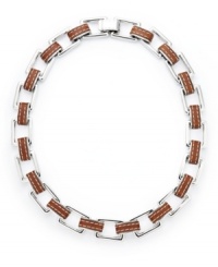 Industrial chic. This eclectic necklace from the Lauren Ralph Lauren collection features heavy rectangular links in concert with a trendy leather band. Set in silver tone mixed metal. Approximate length: 18 inches. Industrial chic. This eclectic necklace from the Lauren Ralph Lauren collection features heavy rectangular links in concert with a trendy leather band. Set in silver tone mixed metal. Approximate length: 18 inches.