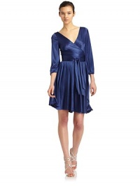 THE LOOKV-necklineCrossover wrap bodiceThree-quarter length sleeves with elasticized cuffsSoft ties at gathered waistSide zipDeep V-backTHE FITAbout 39 from shoulder to hemTHE MATERIALRayonCARE & ORIGINDry cleanImportedModel shown is 5'9½ (176cm) wearing US size 4. 