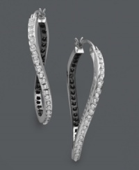 Shine from the inside out! These unique hoop earrings feature sparkling white diamond accents on the outside and black diamond accents on the inside. Twisted oval setting crafted from sterling silver. Approximate drop length: 1-1/2 inches. Approximate drop width: 1 inch.